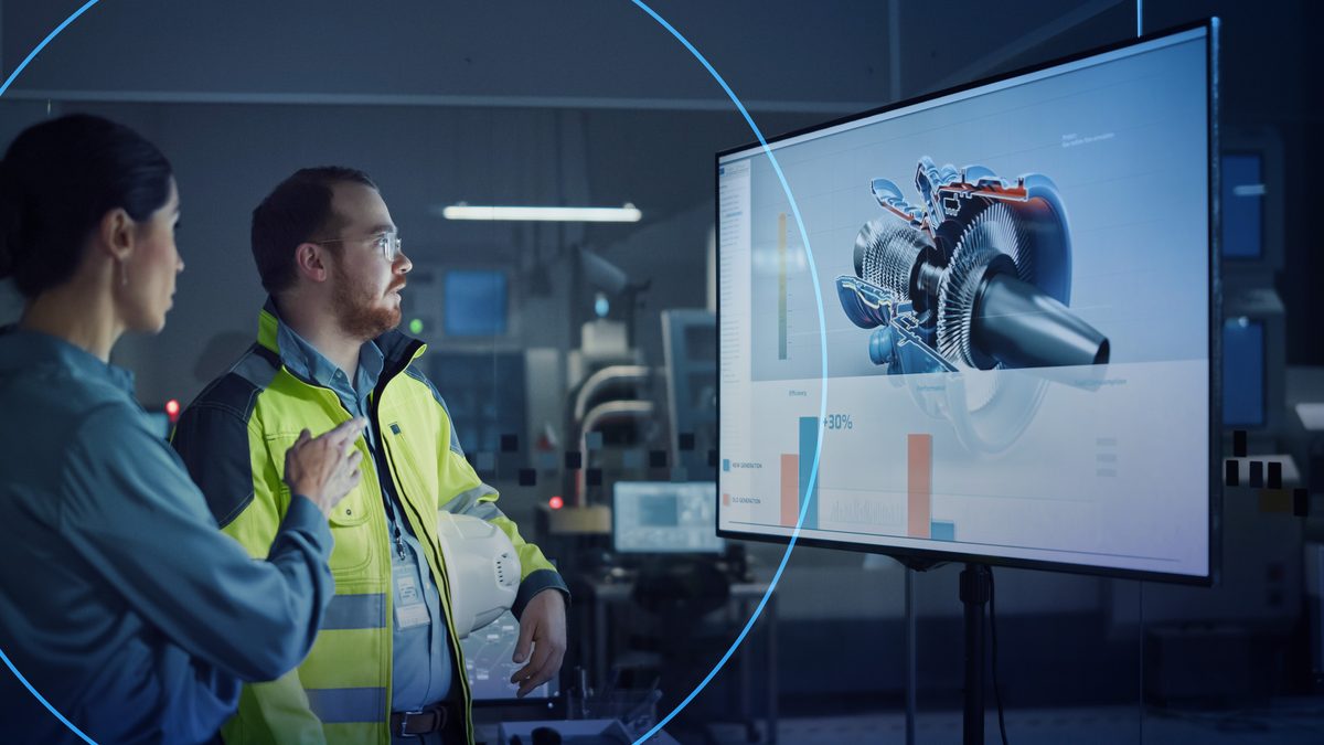 Engineers collaborating in factory